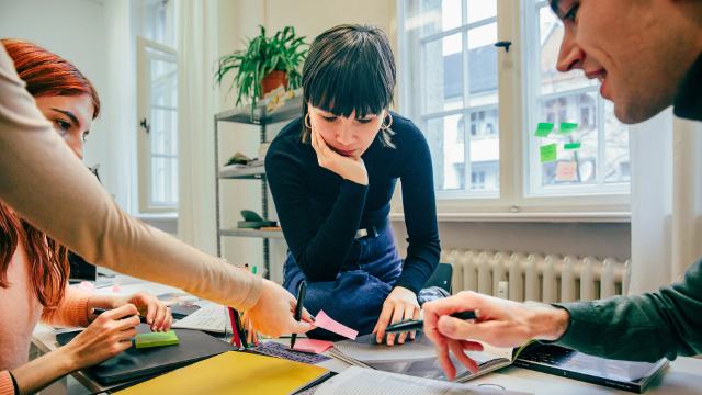 colleagues brainstorming in office