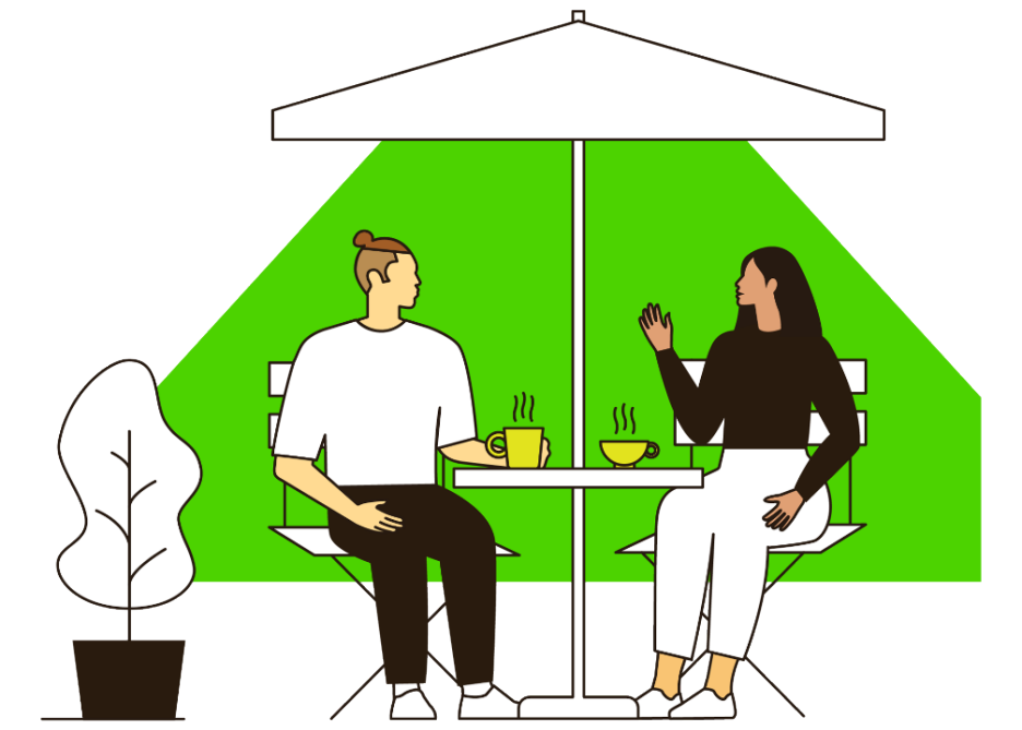 man and woman sat outside under parasol, drinking hot beverages and chatting 