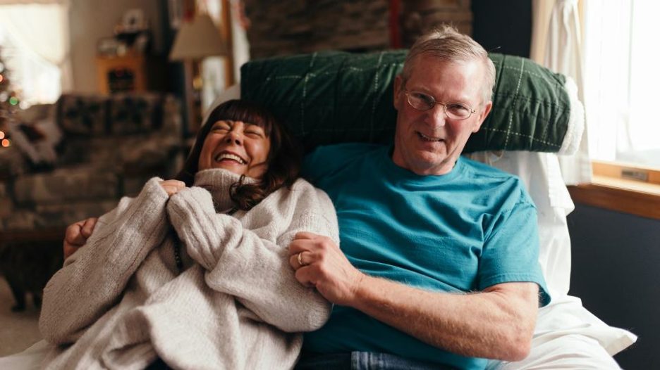 relaxed man and woman pose for a fun portrait 